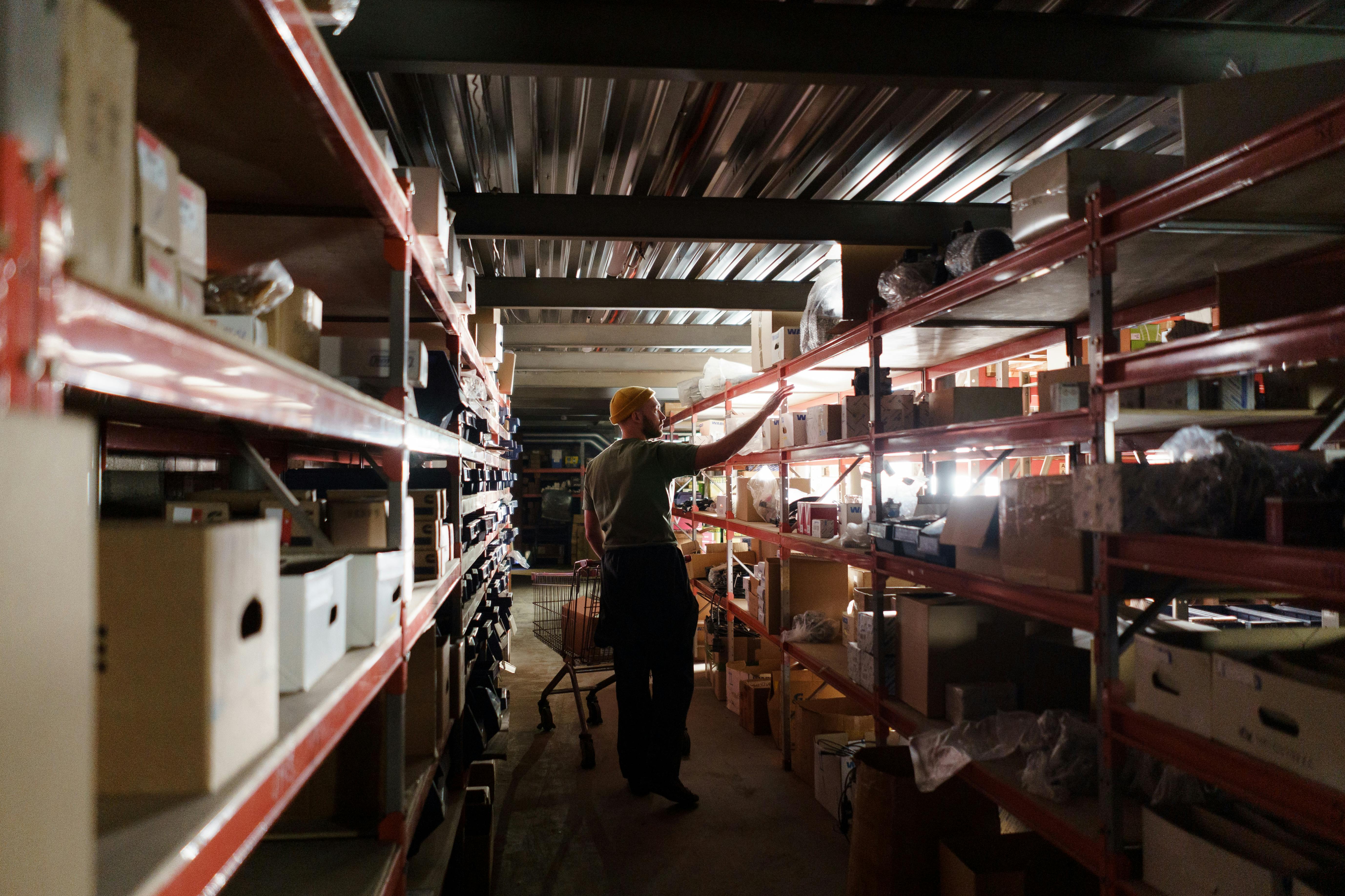 A man restocking items on his inventory room for an Instagram story